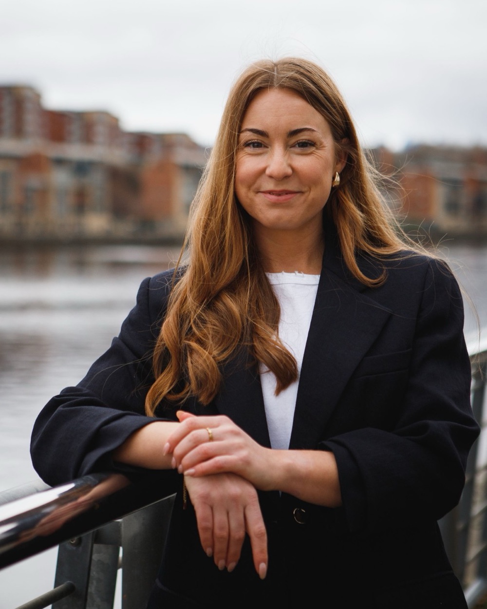 Melissa Jones, founder of Lemonade Studios, smiling by the river